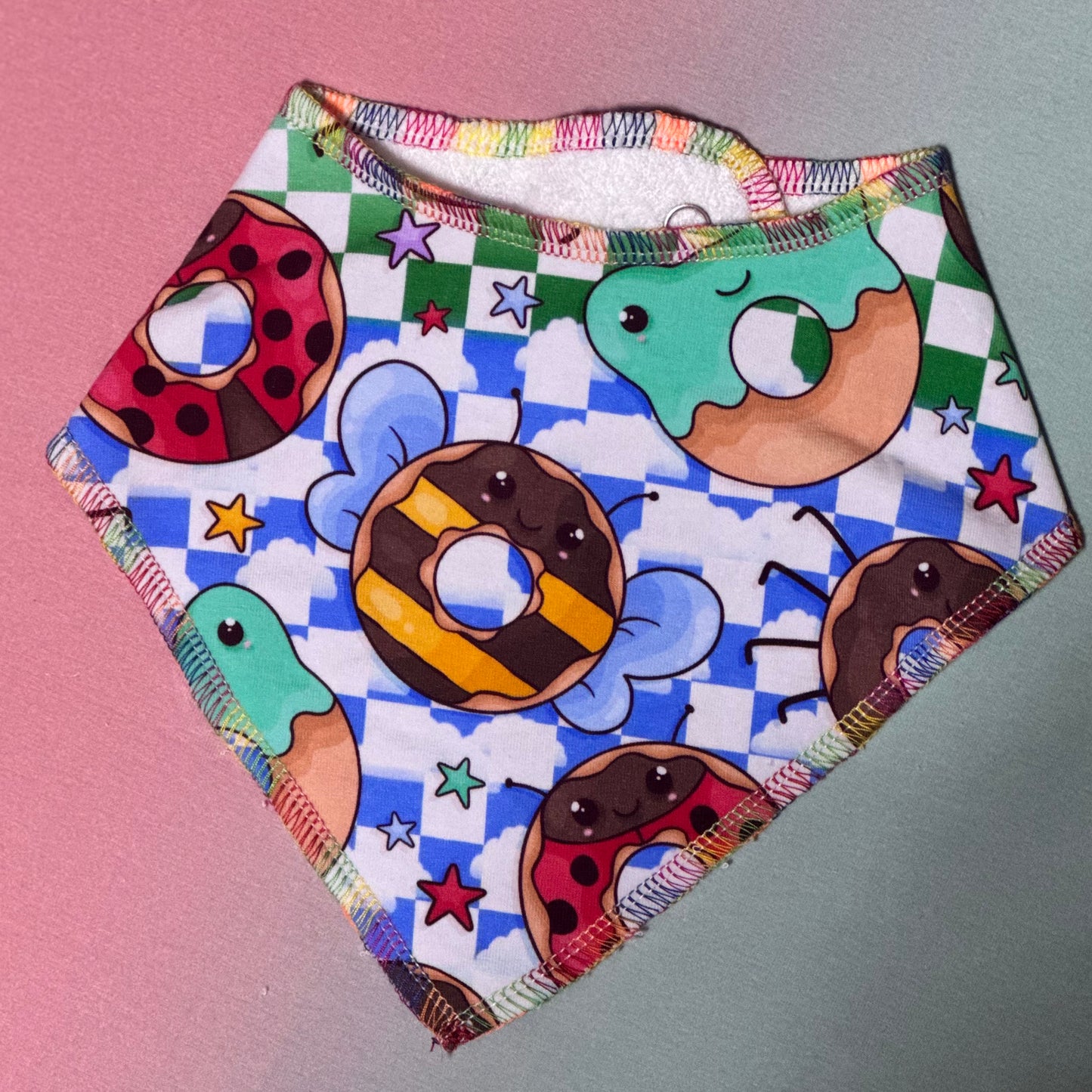 Raw edge baby bib - critter donuts